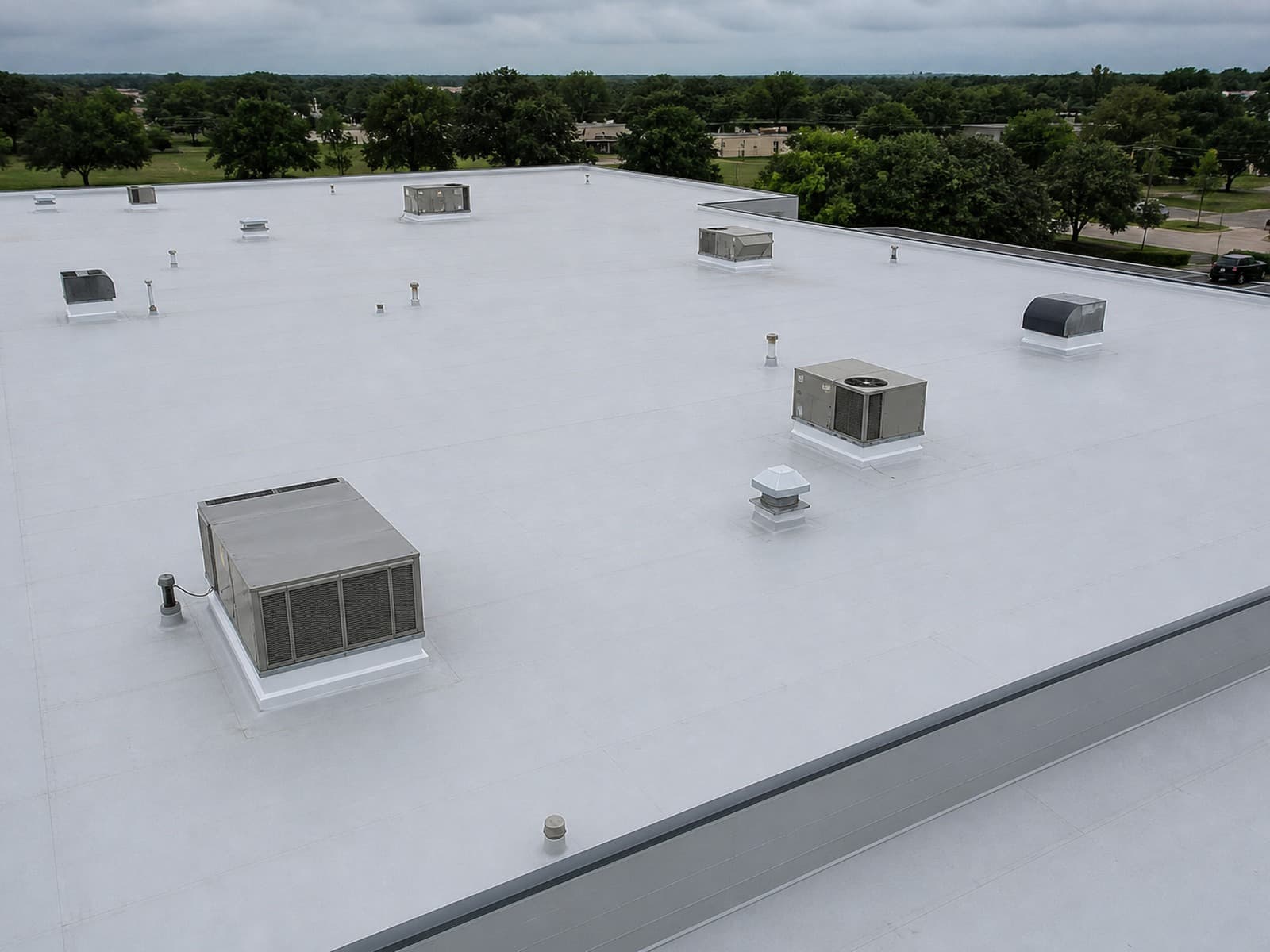 Same commercial rooftop after new TPO membrane installation